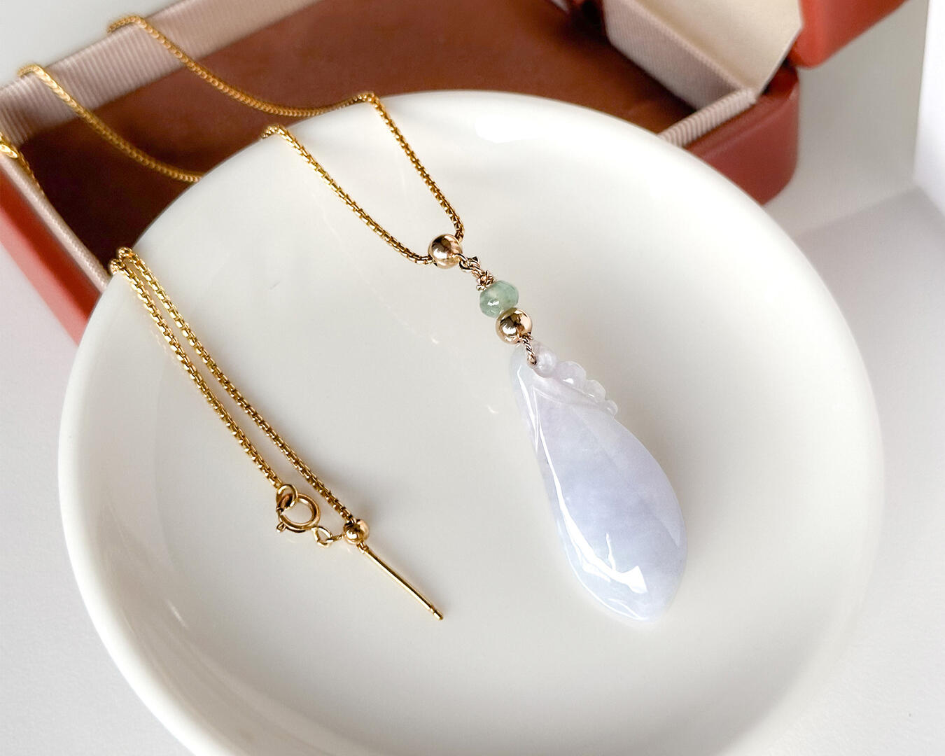 Lavender Tinted Teardrop Shaped Jadeite Pendant Close up