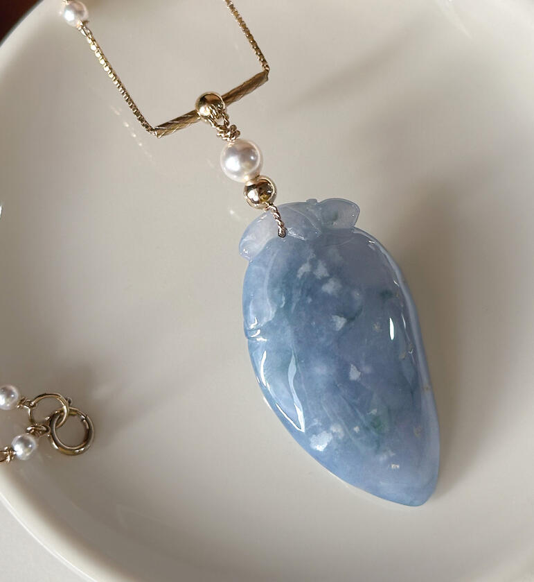 Purple Jadeite pendant with gold colour beads and pearl beads made into a bail strung on a gold chain