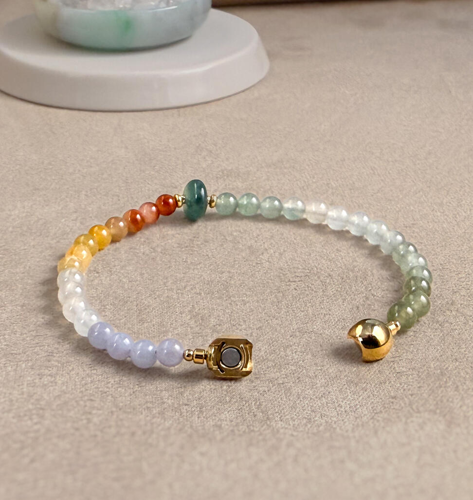 Close Up Detail Close Up Detail Five Colour Ombre Jadeite Bracelet with Magnetic Clasp Lying on table