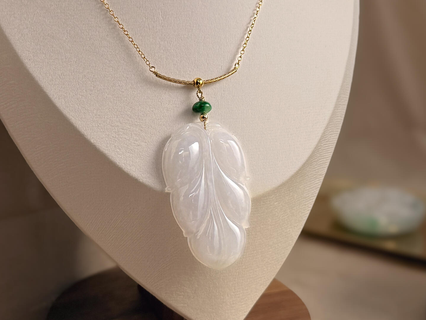 Jadeite Sheer White Leaf with intense green spacer on retail display
