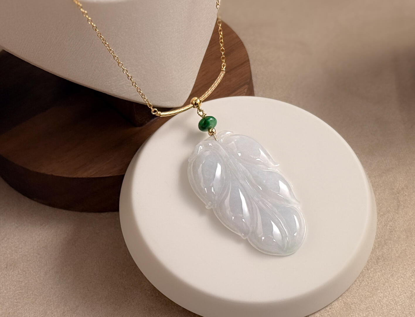 Close up Jadeite Sheer White Leaf with intense green spacer on white disc